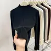 Top de capa base de alta gama con bordes rizados, cuello semi-alto, suéter de punto elegante en capas para mujer para Primavera, Otoño e Invierno 2026