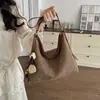 Bolsa de palha tecida retrô de nicho para uso diário para mulheres, verão de 2026, grande capacidade, para o trabalho, ombro e transversal simples