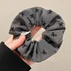 Goma para el pelo con estampado de leopardo marrón para otoño e invierno para mujer, scrunchie elegante y sofisticado para peinados de moño