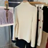 Suave al tacto, suéter coreano Dongdaemun simple con cremallera, cuello alto, holgado, 100% lana pura para mujer, top de punto de invierno