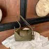 Bolsa de axila nicho transfronteiriça estilo francês para mulheres, nova moda bolsa de ombro tipo bolinho de massa camurça para o dia a dia, bolsa de ombro e transversal casual