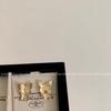 Pendientes de mujer de alta calidad estilo francés fresco retro elegante mariposa exquisita tridimensional estilo europeo y americano