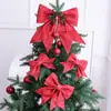 Venta al por mayor de fábrica Accesorios de Navidad Adornos forma tridimensional Adornos de pared Lazo Colgantes de árbol de Navidad Suministros de decoración