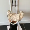 Diseño único, elegante y distintivo bolso tipo dumpling, bolso nuevo para mujer moderno y casual, bolso de hombro y cruzado primavera 2026