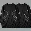 Camiseta casual versátil de manga larga para hombre para otoño, cuello redondo, color liso moderno, cómoda, transpirable y de corte holgado.