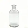 Venta al por mayor de fábrica Botellas vacías personalizadas de vidrio para aromaterapia para uso doméstico Botellas de aromaterapia de 250 ml Adornos de botella vintage Forma cilíndrica