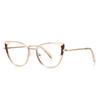 Pegamento dorado nuevos lentes anti luz azul 3127 tendencia sudamericana ojo de gato para mujer montura comercio exterior lente plana se puede equipar con miopía