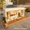Cafetería con ventanilla abierta, puesto de snacks moderno a pie de calle, diseño modular para calles comerciales en el parque