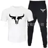 T-shirt Masculina de Manga Curta e Calça Suit Casual Venda Quente Transfronteiriça Gola Redonda Cor Lisa Roupa Esportiva Casual com Estampas e Impressão