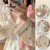 Artículo Caliente de Primavera y Otoño 2026 Pijama de Algodón Burbuja para Mujer Crepé Dibujos Animados Holgado Dulce Manga Larga Conjunto de Ropa para el Hogar