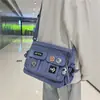 Bolsa de Ombro Masculina Multifuncional Japonesa Grande Capacidade Bolsa Transversal Feminina 2024 Primavera Nova Pasta Simples Bolsa da Moda