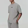 Essentials Nueva Marca de Moda Estadounidense Camiseta Casual Holgada de Manga Corta de Verano Ropa Versátil para Hombre de la Calle