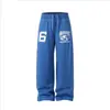 Pantalones largos versátiles, cálidos y cómodos, de estilo americano, bordados y estampados, de pierna ancha, corte relajado, para hombre y mujer, de la fábrica Xingyufang, pants casuales