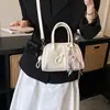 Bolso de mano exquisito de nicho transfronterizo, bolso versátil popular de moda primavera-verano para hombro y cruzado, bolso pequeño casual para mujer
