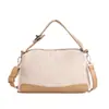 Bolsa criativa de linho listrada 2026 nova bolsa de ombro versátil com um toque elegante e de alta qualidade, bolsa transversal casual