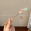 Horquilla antigua de Hanfu con forma de flor para mujer, estilo chino, con borlas de alta gama para caminar, para la parte posterior de la cabeza, con disco para el cabello