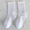 Meias Esportivas Femininas de Alta Elasticidade para Cruzamento de Fronteiras Meias Pretas e Brancas de Cano Médio para Estudantes Meias de Algodão Absorventes de Suor Casuais Meias Longas de Cor Sólida para Mulheres