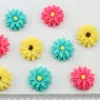 Resina de crisantemo al por mayor material DIY hecho a mano para ropa accesorios parches para carcasa de teléfono móvil decoraciones 19 mm