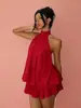 Vestido sexy de primavera y verano estilo europeo y americano para chica popular, un artículo popular para ventas transfronterizas, perfecto para vacaciones en la playa, con un diseño de cuello halter de malla y un estilo hasta la rodilla, hecho de gasa
