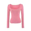 Camiseta sexy estilo americano de corte bajo con cuello en U grande para mujer con bolsillos de parche, costuras densas, corte ajustado, manga larga, top de base de manga larga de longitud corta