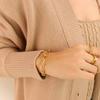 Estilo Ins geométrico europeo y americano, traje de pulsera y collar con hebilla en forma de U, cadena desnuda de acero de titanio simple de lujo para hombres y mujeres, primera generación de pelo