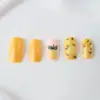 Peças de Nail Art Mais Vendidas Transfronteiriças, Estilo Fresco de Verão, Flores Amarelas Pequenas de Limão, Unhas Postiças Quadradas de Comprimento Médio Atacado