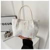 Bolso de mano informal de color sólido de estilo occidental, bolso grande de moda simple, bolso de mujer, nuevo estilo de invierno 2024, bolso con textura debajo del brazo