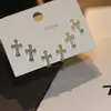 Pendientes pequeños de una semana, populares pendientes pequeños de aguja de plata S925, una tarjeta, tres pares de pendientes de combinación de traje, pendientes de circonita roja de red para mujer
