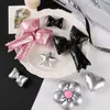Serie miu accesorios de cuero plateado brillante lazo corazón floristería decoración de ramo llavero materiales DIY al por mayor