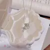 Collar de cruz de diseño original, una pieza lujosa y única con un toque de alta gama, una cadena para la clavícula con múltiples elementos, un estilo dulce y cool, y un collar versátil
