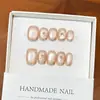 Diosa del SolHielo Transparente y Suave Perlas de Vidrio Color Nude Ojo de Gato Chapado en Oro Estilo Francés Uñas Portátiles de Alta Gama Hechas a Mano
