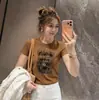 Camiseta Impresa Estilo Retro Americano para Mujer Verano 2026 Ajuste Delgado Versátil Moderna de Manga Corta