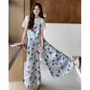 Conjunto de Duas Peças Feminino Verão Patchwork Irregular Falso Duas Peças Top com Cordão Calça de Perna Larga Floral Nicho de Luxo Tamanho Plus