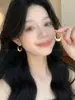 Pendientes ovalados transfronterizos europeos y americanos, lujo ligero, alta gama, diseño de gancho de oreja moderno y exquisito, pendientes de estilo nicho para mujer