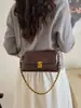 Bolso de hombro de nicho retro transfronterizo nuevo para mujer, bolso de mano versátil de alta gama, bolso elegante para el antebrazo para ir al trabajo