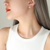 Pendientes de mujer al por mayor de acero de titanio con borlas y costura de cadena con personalidad de temperamento británico en forma de U, no se decoloran