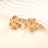 Brincos de Metal Plissado Tridimensional com Gotejamento de Óleo Estilo Europeu e Americano Brincos de Stud Petal de Luxo Leve da Moda