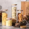 Frasco de Vidrio de Borosilicato Sellado de Alta Venta Transfronteriza Botella de Almacenamiento Frasco de Almacenamiento de Dulces Redondo Recto Tapa de Bambú Frasco para Té