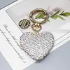 Llavero de corazón de diamantes completos colgante para llave de coche etiqueta de moda se puede abrir llavero de amor