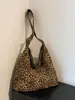 Bolso de Lona Estampado de Leopardo Gran Capacidad para Mujer 2026 Nuevo Estilo Bolso de Mano Bolso de Hombro Bolso Tote Práctico de Gran Capacidad