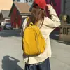 2025 Nueva Llegada Mochila Escolar de Lona Lavada para Estudiantes Universitarias Mochila Casual de Viaje Harajuku Color Sólido Mochila Simple para Mujeres