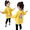 Camiseta Básica Infantil Cartoon Primavera e Outono 2026 para Meninas, Nova Camiseta de Manga Longa Estilosa Versão Coreana para Meninas
