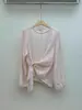 Colección Otoño 2026: Camisa de estilo coreano, ligeramente transparente, de cuello redondo, tipo jersey, con un diseño asimétrico