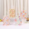 Bolsa de papel Kraft con estampado de flores bolsa de embalaje de flores coloridas estilo ins bolsa de regalo simple bolsa de embalaje pequeña fresca