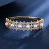 Pulsera Hueca con Perlas Artificiales y Circonitas Incrustadas Exquisita Elegante Moderna Sensación de Alta Gama Versátil para Banquetes Vestidos de Noche y Uso Diario