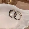 Pendientes de anillo liso exagerado con aguja de plata S925 de estilo europeo y americano para mujer, pendientes de temperamento simple Joker de lujo ligero de alta gama, venta al por mayor