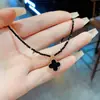Estilo Coreano Moderno y Sencillo Flor de Cuatro Hojas Diseño de Correa Corta para el Cuello Cadena de Cristal para la Clavícula Femenina de Alta Gama Versátil Lujo Ligero