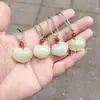 Venta al por mayor de fábrica jade afgano natural jade blanco azul candado ruyi colgante de jade estudio candado Xiangyun colgante de jade colgante