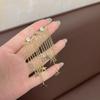 Novos brincos de borla estrela de cinco pontas de metal com senso de alta qualidade, moda longa e elegante, temperamento curinga, joias de orelha no atacado