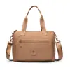 Bolso bandolera para mujer 2026 nuevo diseño de moda elegante, bolso pequeño de lona para llevar al hombro y en la mano, bolso de mano exquisito y versátil